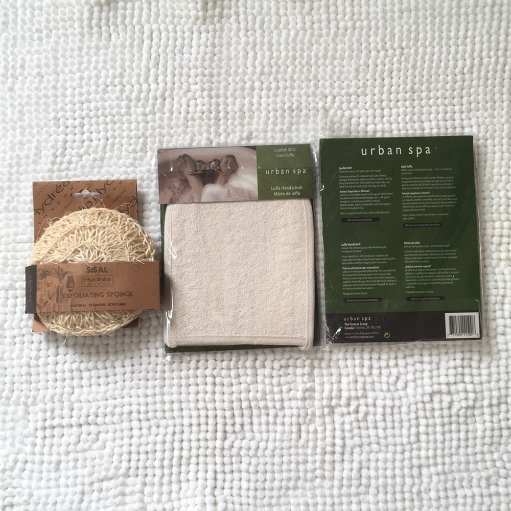 Exfoliating sponge and two Loofah mitts